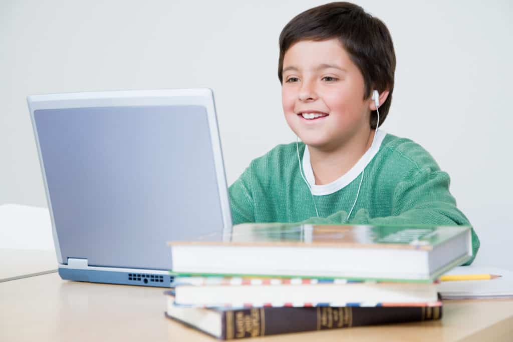 Elementary student using a laptop 