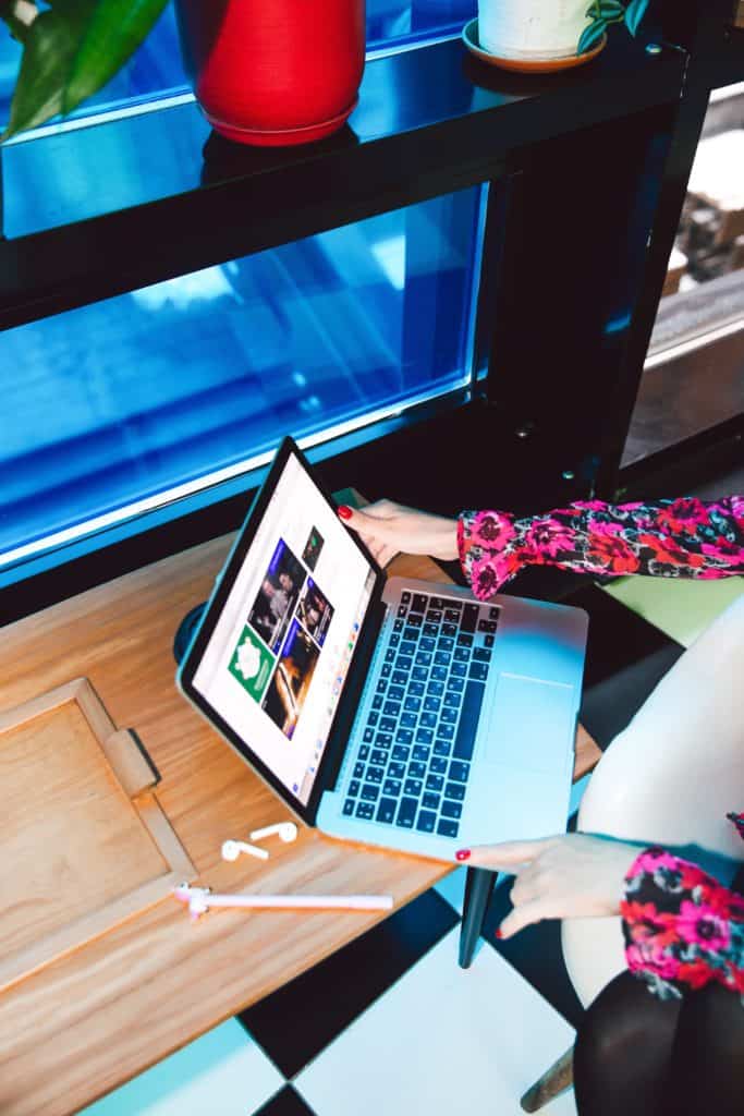 Woman browsing through her laptop
