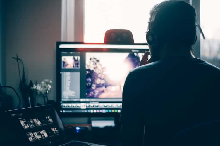 Man looking at his computer monitor