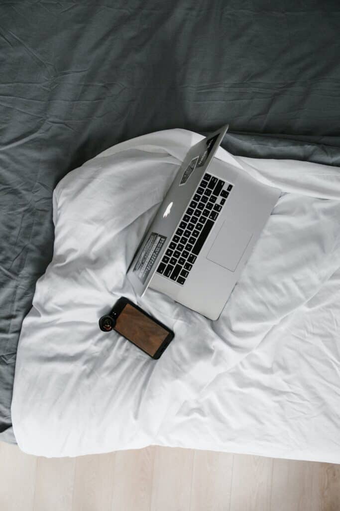 Laptop on bed