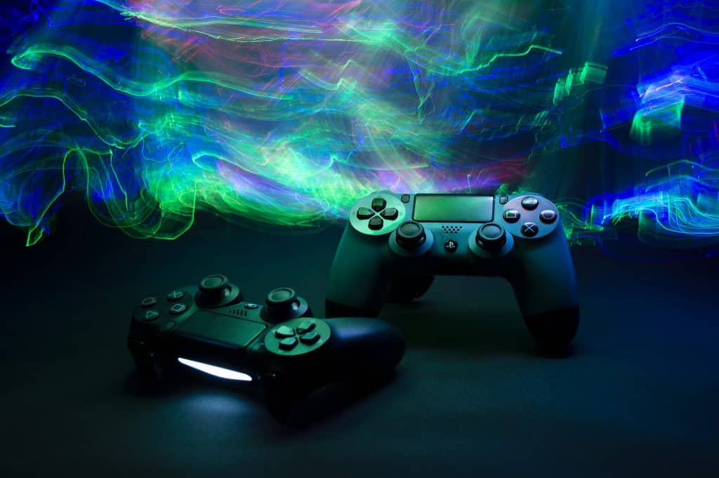 colourful lights above playstation 4 controllers
